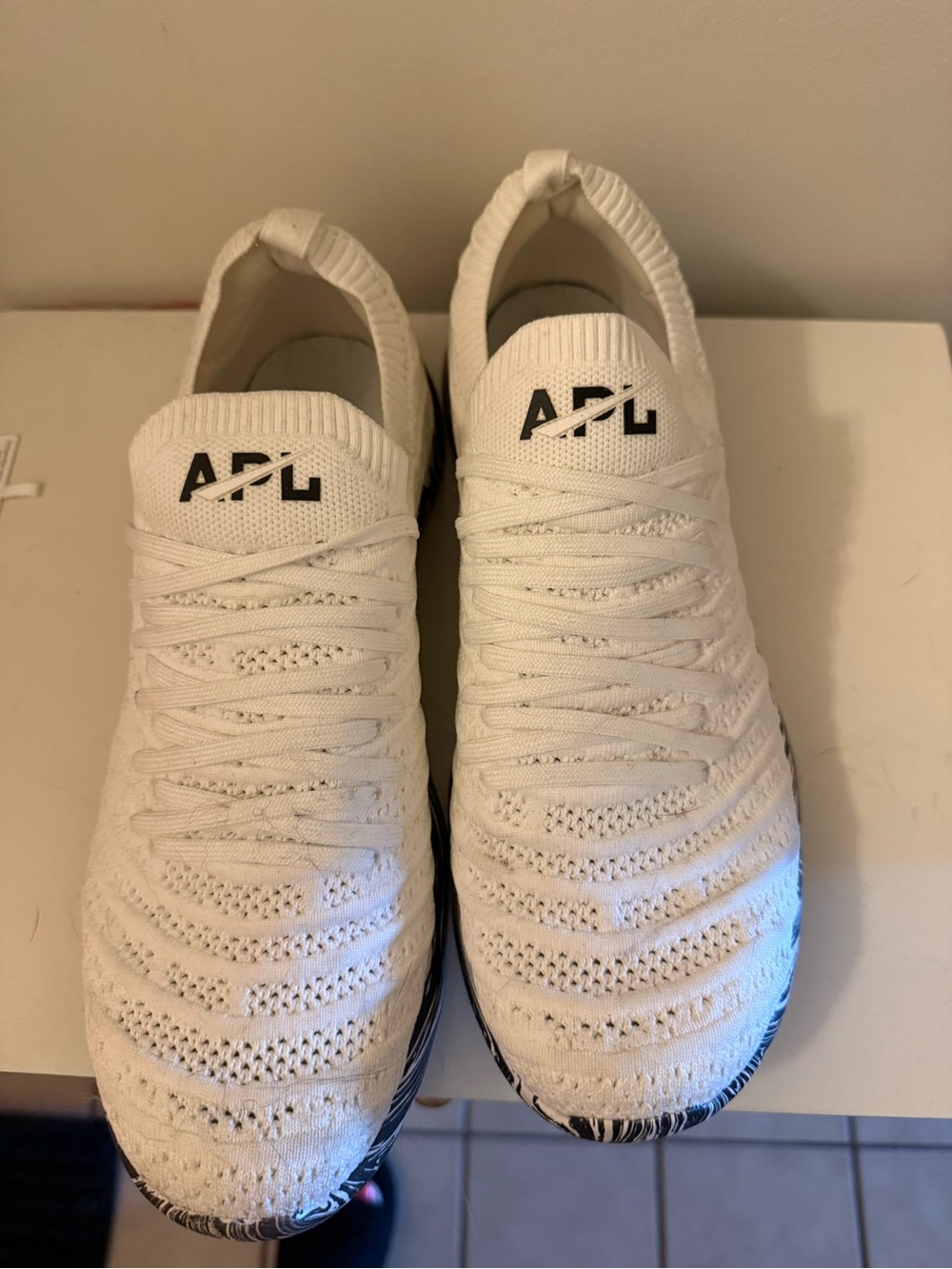APL Men's Knit Slip-On Athletic Sneakers in White with Black Accents